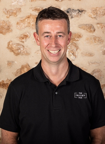 The image is a photo of physiotherapy practice owner David Giles